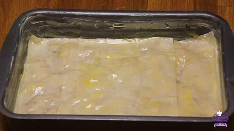 Bregovska Pita - Croatian Layerd Pie Recipe | Bregovska Pita is a Croatian layered pie handed down through generations. It's made with layers of filo dough, apple, raisins, and walnuts. | http://www.cakieshq.com | Step 18