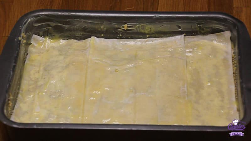 Bregovska Pita - Croatian Layerd Pie Recipe | Bregovska Pita is a Croatian layered pie handed down through generations. It's made with layers of filo dough, apple, raisins, and walnuts. | http://www.cakieshq.com | Step 21