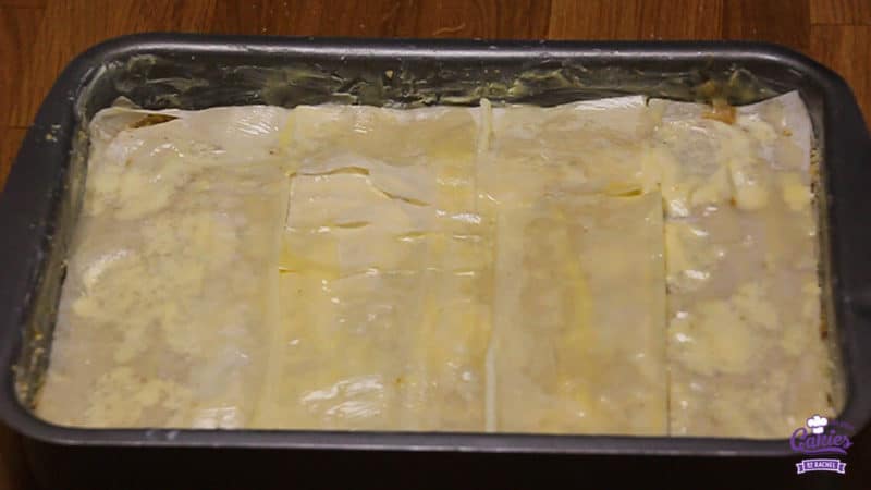 Bregovska Pita - Croatian Layerd Pie Recipe | Bregovska Pita is a Croatian layered pie handed down through generations. It's made with layers of filo dough, apple, raisins, and walnuts. | http://www.cakieshq.com | Step 28
